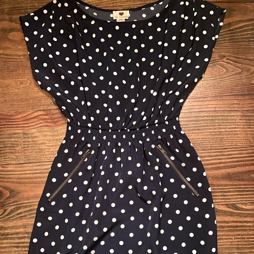 New without tags. Never been worn. Navy/White Dots